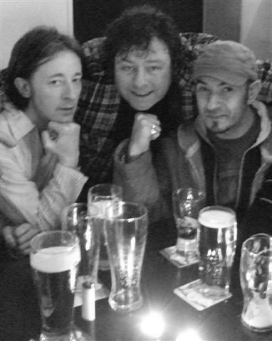 Upstate Renegade Productions AGM - Derry, Ireland. January 2009. Left to right: (L) Admin Assistant, Co-Director, Editor & technician: Diarmuid McGowan. (C) Administrator, Media Producer, Owner of Upstate Renegade Productions, Promotor, Publicity Consultant, e-Publisher & Writer: Louis P. Burns aka Lugh. (R) Global A&R / 1st Music Director / Soundtrack Specialist & Marketing Manager - UK: Andrew West. This image is subject to international copyright law. All rights reserved.